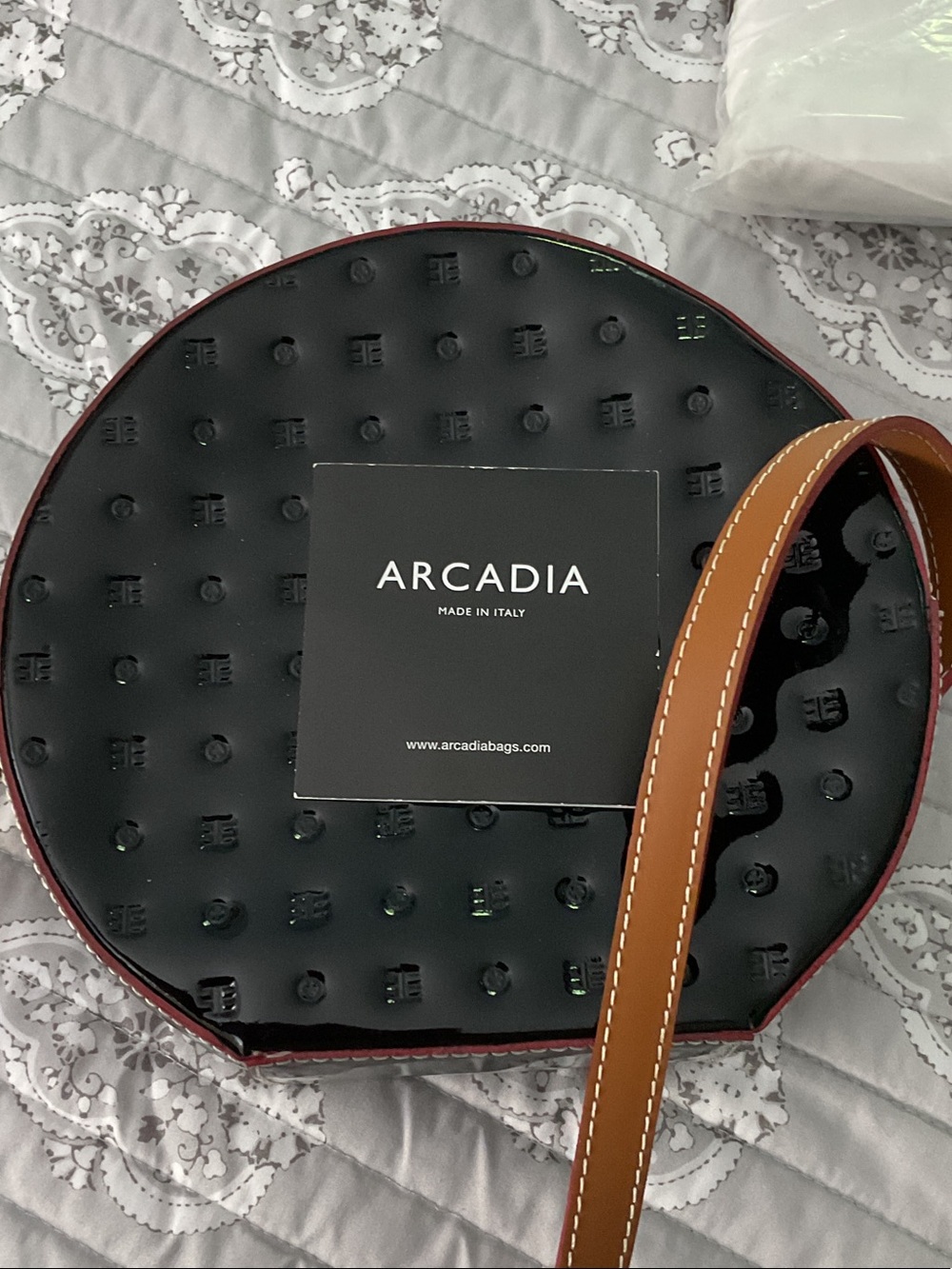 Arcadia Black Circular Leather Crossbody with Brown Strap
